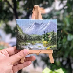 This mountain stream painting looks so cute on its little easel. It’s a complete package that makes a wonderful gift for anyone who loves nature and the mountains. The easel is included with every painting.