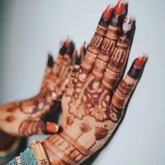 A duplicate image showcasing the beautiful close-up of the henna stain and nails.