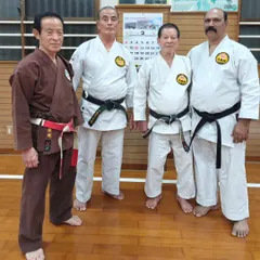 Training in Kobudo alongside my teachers Maeshiro Sensei, Asato Sensei, and Saijo Sensei at the Honbu Dojo in Okinawa. Continuous learning from these masters is essential to my own growth and teaching.
