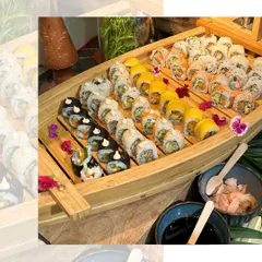 Our Sushi Boat is a showstopper. We carefully arrange a variety of freshly made sushi rolls on a beautiful wooden boat, served with soy sauce, wasabi, and pickled ginger. It's perfect for adding a touch of elegance to your event.