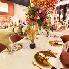 A table setting is the prelude to the culinary symphony. We design each tablescape with an eye for elegance, using gold accents, fine china, and lush florals to create a canvas of distinction for the feast that will follow.
