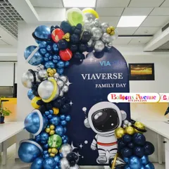 An astronaut-themed balloon decoration for a corporate family day event. This shows that the space theme is versatile and great for more than just birthdays.