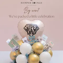 When it's time for a big win, I pack a celebration. This Father's Day hamper is a burst of joy with a "Super Dad" balloon, photos, and fun cards to cheer him on.