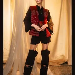 An avant-garde fashion look that required a careful balance of composition and lighting. We used warm ambient light and a low camera angle to create a powerful visual narrative that highlights the outfit's unique structure.