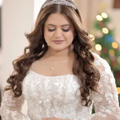 Turning bridal dreams into reality. These portraits showcase the elegance of a Christian bridal look, with a focus on soft, ethereal makeup and a timeless hairstyle.