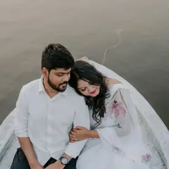 After the proposal, a quiet moment of reflection on the boat. These are the peaceful, in-between moments we love to capture, where the reality of the commitment sinks in.