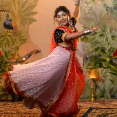A full-body shot showcasing the twirl-worthy 'Ram Leela' inspired lehenga. This outfit is designed for movement, making it a fantastic choice for dance performances or Garba nights.