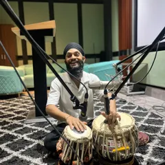 A happy moment during a recording session for a new song. The joy of creating music with other artists is a blessing. You can see the professional multi-mic setup we use to capture the rich, detailed sound of the tabla.