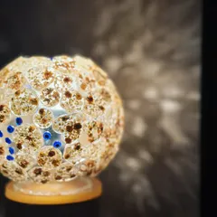 Imagine your wedding flowers lighting up your room. This is one of my most loved creations, a custom globe lamp made from a couple's varmala. It's not just a lamp; it's a glowing reminder of your big day, handcrafted with love and a little bit of magic.