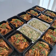 Here is a large order of my Chilli Garlic Crabs and Egg Fried Rice, all packed in convenient containers. This is how I handle bulk orders for parties and family dinners, ensuring everything is fresh.