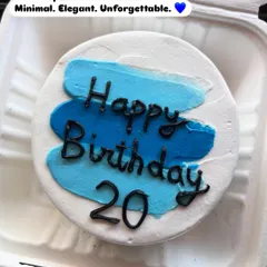 This minimalist bento cake for a 20th birthday is elegant and unforgettable. The abstract blue brushstrokes create a modern art feel, perfect for a stylish celebration.
