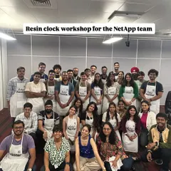 This is the fantastic team from NetApp showing off the resin clocks they created during their team outing with us. We love seeing colleagues become artists for a day, bonding over something fun and creative outside the office.