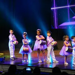 Our little performers posing with their mini drums after their adorable Bollywood performance. They are the future stars of the stage!