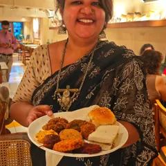 Here I am, in my element! Nothing makes me happier than sharing a plate of food made with love. This is the joy I bring to every supper club and catering event.