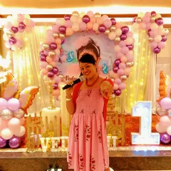 Hosting a first birthday party is a milestone moment for the whole family. I ensure the event is filled with joy, from welcoming guests to leading the cake-cutting ceremony.