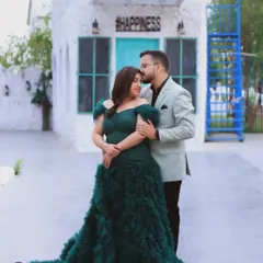 An intimate couple's portrait from a maternity shoot. The focus here is on the connection between the parents-to-be, captured in a quiet, tender moment.