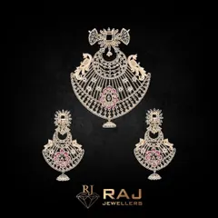 A beautiful pendant and earring set mounting featuring peacock motifs and delicate pink stone settings. This base is perfect for creating a piece that is both traditional and feminine.