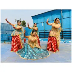Our folk dance team posing in traditional attire. We provide professional dance troupes for army functions, cultural celebrations, and corporate events, showcasing the beauty of Indian culture.
