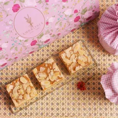 Our almond toffee bars, with a buttery shortbread base and a generous topping of toasted almonds, are a crunchy, sweet, and utterly addictive treat.