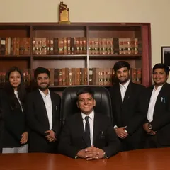 A portrait with some of my junior colleagues in my office. Mentoring them and watching them grow is one of the most rewarding aspects of my work.