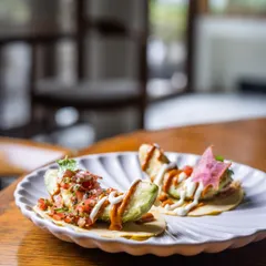 The sensational Avocado Taco, with roasted tomato salsa and pico de gallo on a fresh Ajwain Tortilla. It's a burst of fresh, vibrant flavours.