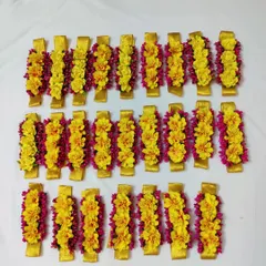 Another look at the handmade floral bracelets for bridesmaids. Each one is carefully crafted to be a beautiful and memorable favor for your closest friends.