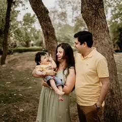 I love capturing the unposed, happy moments during an outdoor family session. The genuine laughter and connection between this family in a beautiful park setting is what makes a portrait timeless.