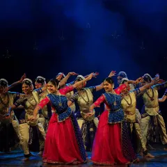 Our Natyanjali ensemble in a dynamic Bharathanatyam formation. We train dancers in creating powerful and synchronized group choreographies that captivate the audience.