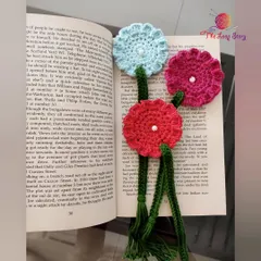My Summer Flower bookmarks, featuring three colorful blossoms with green stems, are a beautiful way to mark your page.
