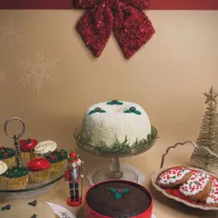 This is what my Christmas dreams are made of. Our full holiday spread includes everything from the Tom Cruise-inspired coconut bundt and traditional fruit cake to festive cupcakes and marzipan, all crafted with comforting, nostalgic flavors.
