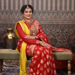 Another angle from the same shoot, showing the regal posture and the elegance of the complete look.