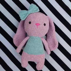 The full view of the custom plush bunny. Her long, floppy ears and soft body make her the perfect cuddly companion.
