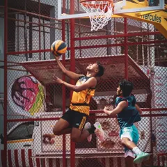 It's all about skill, timing, and the courage to take the shot. I capture moments of peak performance like this layup during the Junior Basketball League, where young athletes showcase their talent in a competitive setting.