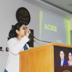 Here I am, explaining the fundamentals of acne during an awareness talk. My goal is to demystify common skin conditions for the public.