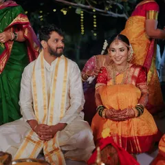 A candid moment from a beautiful South Indian wedding ceremony. My bride Vaishnavi looks so serene and elegant in her traditional attire, with makeup that enhances her features while respecting the classic aesthetic.