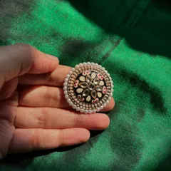 Another stunning Meenakari ring, this one with a black base and white Kundan work. A perfect statement piece.