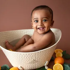 Smiles are guaranteed during my orange bath sessions! These are so much fun and perfect for capturing the playful personality of a sitter-age bub. It's a wonderfully messy and happy way to end a shoot.