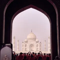 The Taj Mahal, a symbol of eternal love, framed through an archway. I wanted to capture not just the monument, but the experience of seeing it, surrounded by others who are also trying to hold onto the moment.