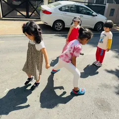 How is a shadow formed? Our pre-kindergarten class went on an expedition to find out. Here they are, observing their own shadows on the street and learning how light creates them.