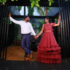 A fun, dancing pose from the same pre-wedding session. The ruffled gown moves beautifully, making it a great choice for dynamic and joyful shots.