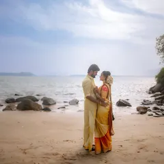 An intimate moment from a beach wedding. The sound of the waves and the endless horizon provide the perfect, serene soundtrack for a couple's new beginning.