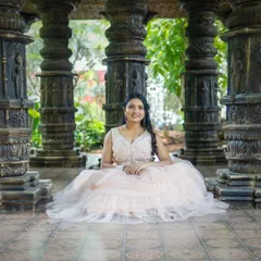 Another shot from the same photoshoot, showcasing the delicate beadwork on the blouse and the full, dreamy skirt of the lehenga.