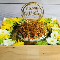 For a tropical twist, I created this Mango Pistachio Tres Leches Hamper. The cake is soaked in three milks and bursting with mango flavor, topped with a crunchy pistachio praline and presented in a wooden crate with fresh flowers.