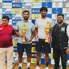 Oges Theyjo Jayaprakash celebrating his back-to-back AITA 1 Lakh Men's Singles titles, here pictured with the finalist and officials.
