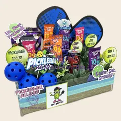 A closer look at the details of our sporty Pickleball Rakhi hamper. We've included fun, quirky stickers and all the essentials for a health-conscious sibling who loves a good match.
