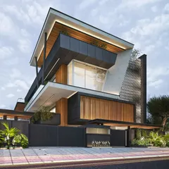 This contemporary farmhouse design features a bold, angular structure with a distinctive perforated metal facade. The combination of dark panels, light concrete, and warm wood creates a sophisticated and modern look.