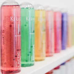 A rainbow of solutions. Each color in our Kérastase Fusio-Dose range targets a different primary hair need, from protein for repair to lactic acid for shine.