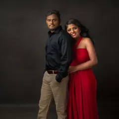A more classic pose from the same couple's session. This image shows their quiet connection and comfort with each other, creating a timeless and romantic portrait.