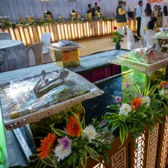 A close up of the food trays on my royal wedding setup, covered to maintain hygiene and freshness before the service starts.