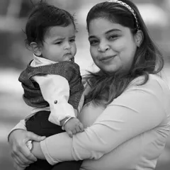 A black and white version of a mother and child portrait, highlighting the textures and expressions without the distraction of color.